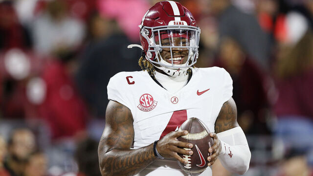 NORMAN, OKLAHOMA - NOVEMBER 23: Quarterback Jalen Milroe #4 of the Alabama Crimson Tide smiles before a game against the Oklahoma Sooners at Gaylord Family Oklahoma Memorial Stadium on November 23, 2024 in Norman, Oklahoma.