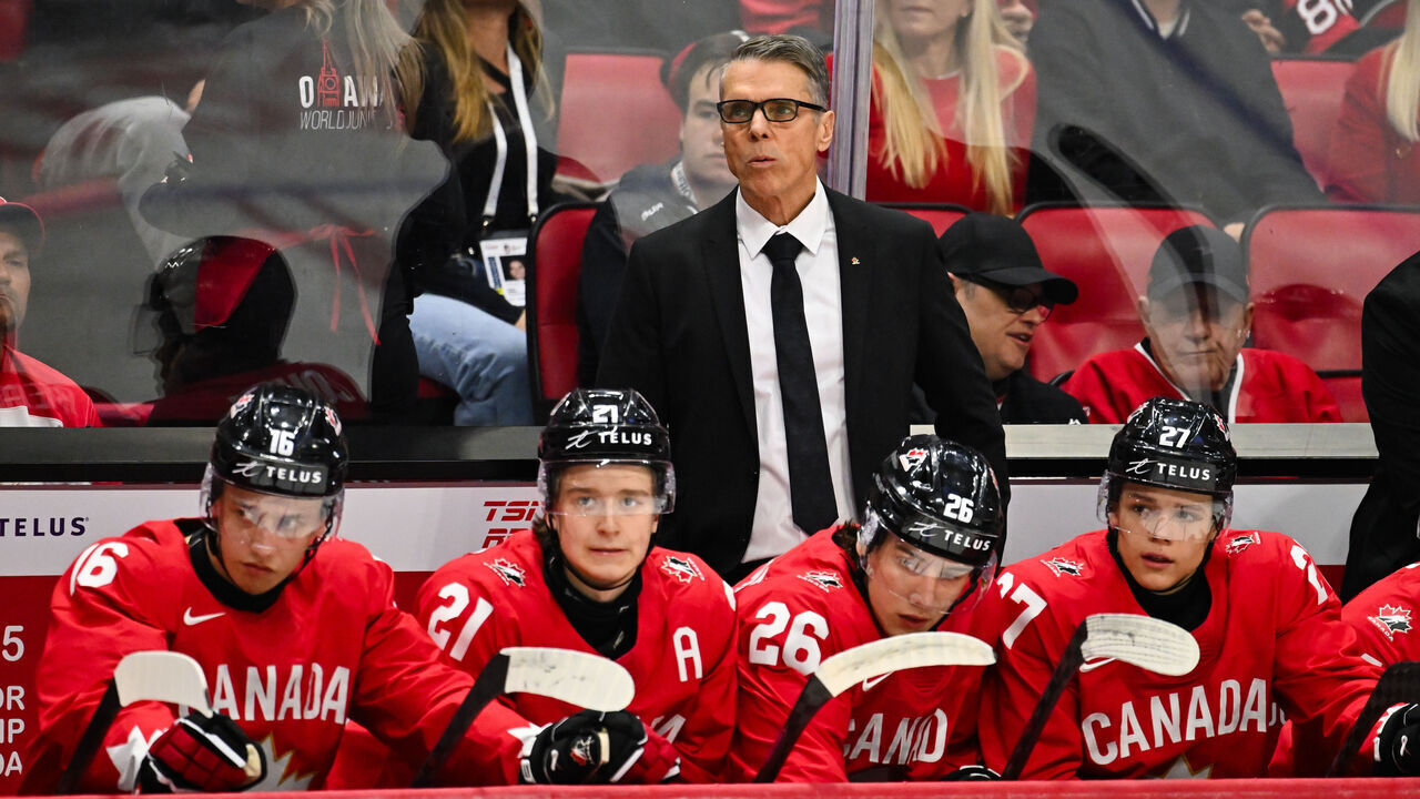 OTTAWA, CANADA - DECEMBER 31: Head coach Dave Cameron of Team Canada handles bench duties in the first period against Team USA of the Group A match during the 2025 IIHF World Junior Championship at Canadian Tire Centre on December 31, 2024 in Ottawa, Ontario, Canada. Team USA defeated Team Canada 4-1.