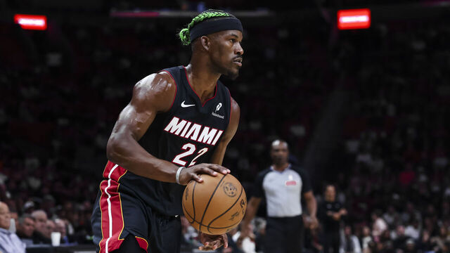 MIAMI, FLORIDA - JANUARY 02: Jimmy Butler #22 of the Miami Heat dribbles the ball against the Indiana Pacers during the first quarter at Kaseya Center on January 02, 2025 in Miami, Florida.