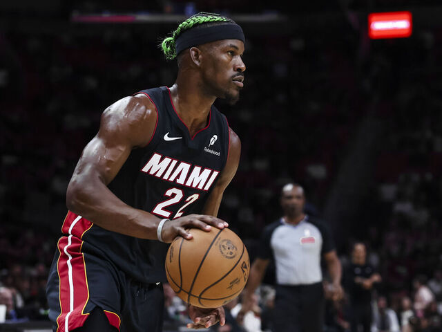 MIAMI, FLORIDA - JANUARY 02: Jimmy Butler #22 of the Miami Heat dribbles the ball against the Indiana Pacers during the first quarter at Kaseya Center on January 02, 2025 in Miami, Florida.
