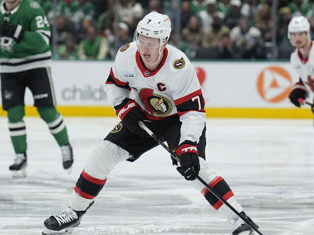DALLAS, TX - JANUARY 2: Brady Tkachuk #7 of the Ottawa Senators handles the puck against the Dallas Stars at the American Airlines Center on January 2, 2025 in Dallas, Texas.