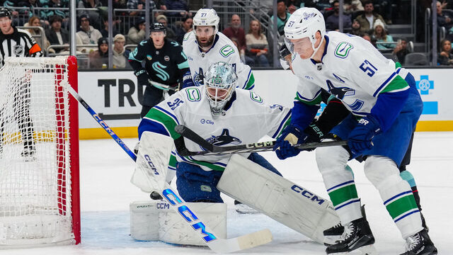 SEATTLE, WASHINGTON - JANUARY 02: Thatcher Demko #35 of the Vancouver Canucks moves to defend the crease during the first period of a game against the Seattle Kraken at Climate Pledge Arena on January 02, 2025 in Seattle, Washington.