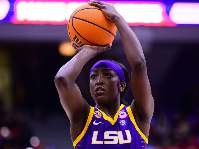 CHICAGO, ILLINOIS - DECEMBER 19: Flau'jae Johnson #4 of the LSU Tigers in action against the UIC Flames at the Credit Union 1 Arena on December 19, 2024 in Chicago, Illinois.
