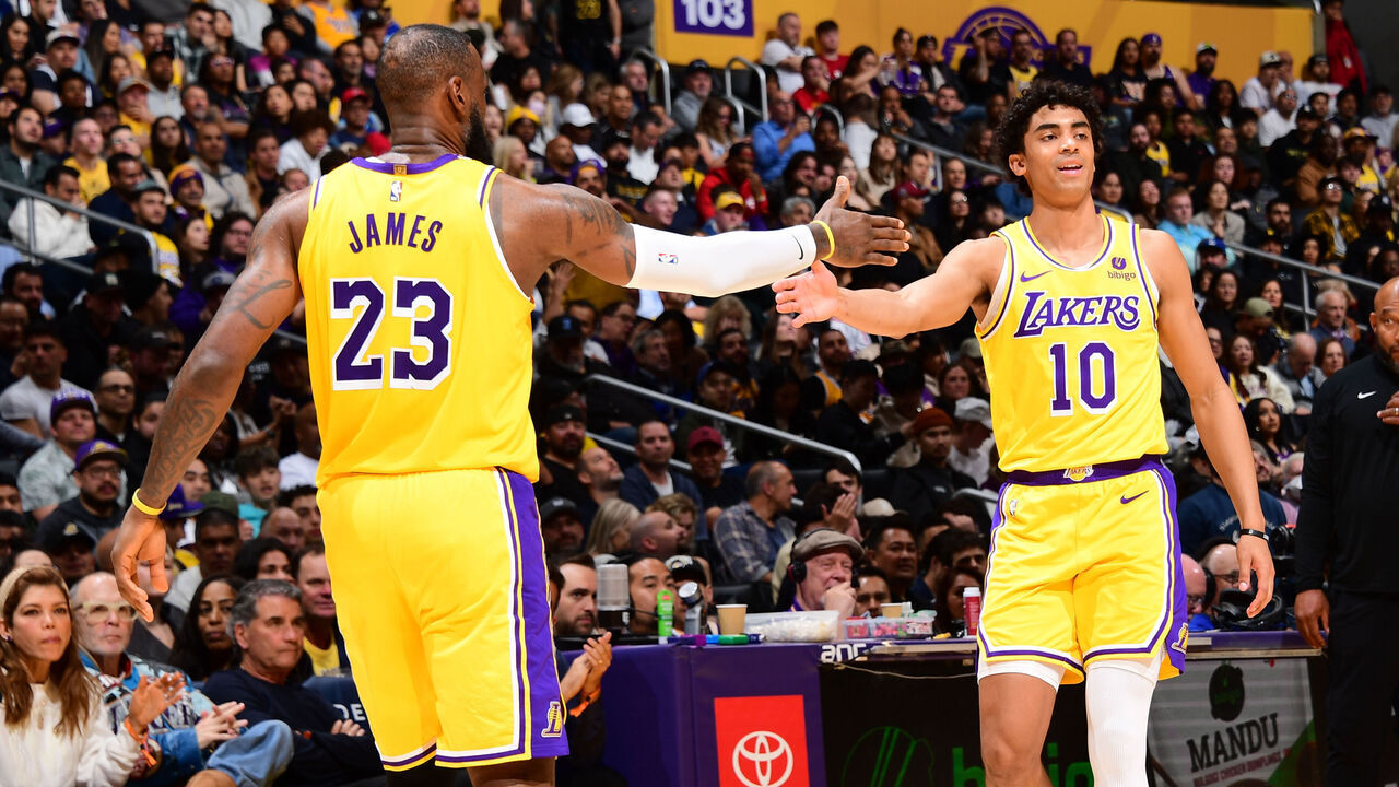 LOS ANGELES, CA - MARCH 18: LeBron James #23 of the Los Angeles Lakers & Max Christie #10 of the Los Angeles Lakers high five during the game on March 18, 2024 at Crypto.Com Arena in Los Angeles, California. NOTE TO USER: User expressly acknowledges and agrees that, by downloading and/or using this Photograph, user is consenting to the terms and conditions of the Getty Images License Agreement. Mandatory Copyright Notice: Copyright 2024 NBAE