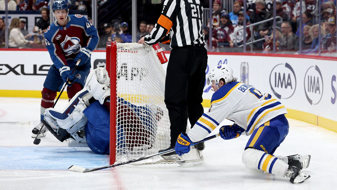 DENVER, COLORADO - JANUARY 02: Zach Benson #9 of the Buffalo Sabres scores past goalie Scott Wedgewood #41 of the Colorado Avalanche in the third period at Ball Arena on January 02, 2025 in Denver, Colorado.