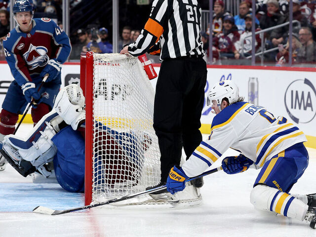 DENVER, COLORADO - JANUARY 02: Zach Benson #9 of the Buffalo Sabres scores past goalie Scott Wedgewood #41 of the Colorado Avalanche in the third period at Ball Arena on January 02, 2025 in Denver, Colorado.
