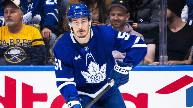 TORONTO, ON - DECEMBER 15: Philippe Myers #51 of the Toronto Maple Leafs skates Buffalo Sabres during the first period at the Scotiabank Arena on December 15, 2024 in Toronto, Ontario, Canada.