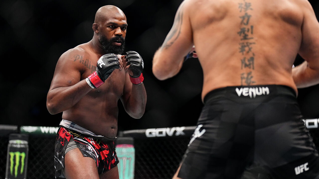 NEW YORK, NEW YORK - NOVEMBER 16: (L-R) Jon Jones of the United States of America faces Stipe Miocic of the United States of America in the UFC heavyweight championship fight during the UFC 309 event at Madison Square Garden on November 16, 2024 in New York City.