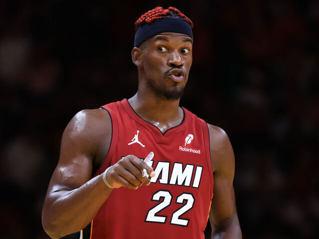 MIAMI, FLORIDA - NOVEMBER 26: Jimmy Butler #22 of the Miami Heat reacts against the Milwaukee Bucks during the fourth quarter of the Emirates NBA Cup at Kaseya Center on November 26, 2024 in Miami, Florida.