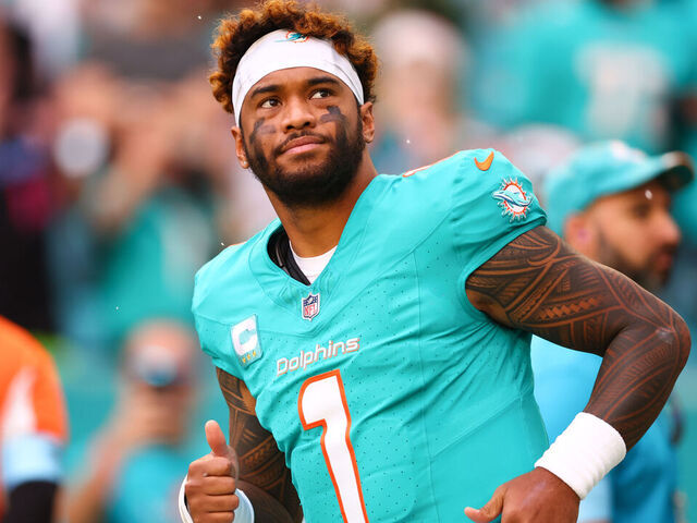 MIAMI GARDENS, FLORIDA - DECEMBER 22: Tua Tagovailoa #1 of the Miami Dolphins takes the field prior to a game against the San Francisco 49ers at Hard Rock Stadium on December 22, 2024 in Miami Gardens, Florida.