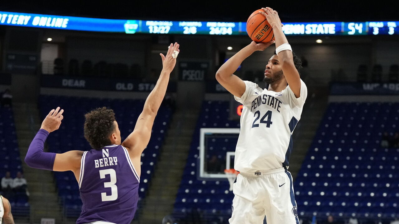 UNIVERSITY PARK, PA - JANUARY 02: Zach Hicks #24 of the Penn State Nittany Lions takes a shot over Ty Berry #3 of the Northwestern Wildcats in the second half during a college basketball game at the Bryce Joyce Center on January 2, 2025 in University Park, Pennsylvania.