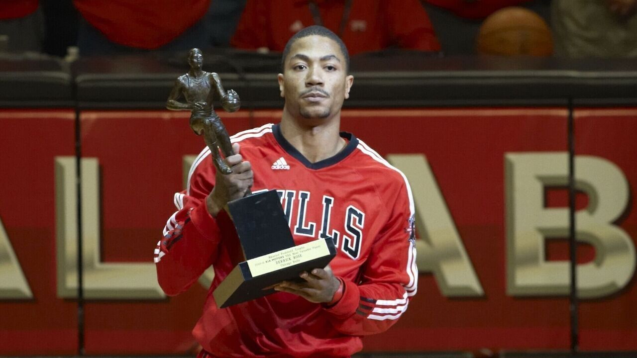Basketball: NBA Playoffs: Chicago Bulls Derrick Rose (1) with Maurice Podoloff MVP Trophy before game vs Atlanta Hawks at United Center. Game 2. Chicago, IL 5/4/2011 CREDIT: Greg Nelson (Set Number: X85914 TK1 R1 F11 )