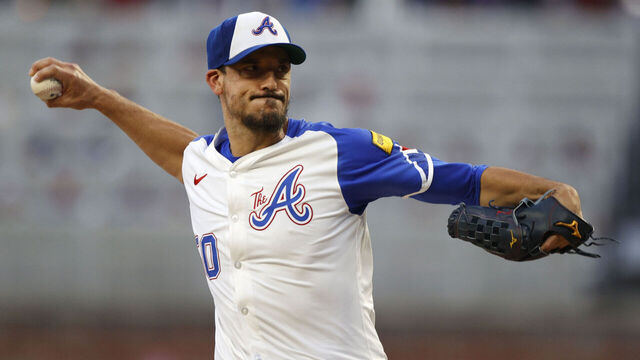 ATLANTA, GA - AUGUST 24: Atlanta Braves starting pitcher Charlie Morton #50 delivers a pitch during the MLB game between the Washington Nationals and the Atlanta Braves on August 24, 2024 at TRUIST Park in Atlanta, GA.