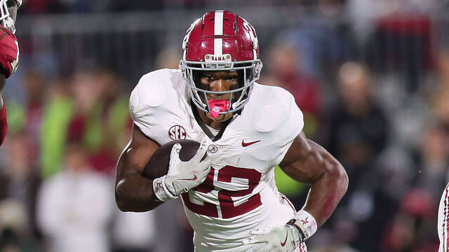 NORMAN, OK - NOVEMBER 23: Alabama Crimson Tide RB Justice Haynes (22) running the ball during a game between the Oklahoma Sooners and the Alabama Crimson Tide at Gaylord Memorial Stadium in Norman, Oklahoma on November 23, 2024.