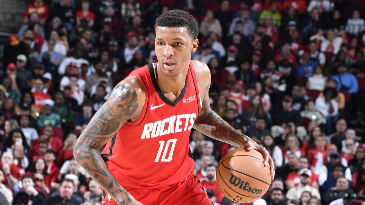 HOUSTON, TX - DECEMBER 29: Jabari Smith Jr. #10 of the Houston Rockets dribbles the ball during the game against the Miami Heat on December 29, 2024 at the Toyota Center in Houston, Texas. Mandatory Copyright Notice: Copyright 2024 NBAE