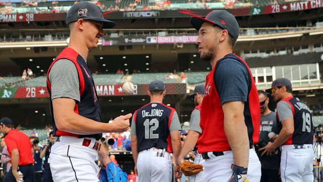 CLEVELAND, OH - JULY 08: Walker Buehler of the National League All-Stars and Alex Bregman of the American League All-Stars speak on during the Gatorade All-Star Workout Day at Progressive Field on Monday, July 8, 2019 in Cleveland, Ohio.