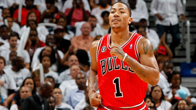 ATLANTA, GA - MAY 12: Derrick Rose #1 of the Chicago Bulls reacts after scoring a basket against the Atlanta Hawks in Game Six of the Eastern Conference Semifinals in the 2011 NBA Playoffs at Phillips Arena on May 12, 2011 in Atlanta, Georgia. NOTE TO USER: User expressly acknowledges and agrees that, by downloading and/or using this photograph, User is consenting to the terms and conditions of the Getty Images License Agreement.
