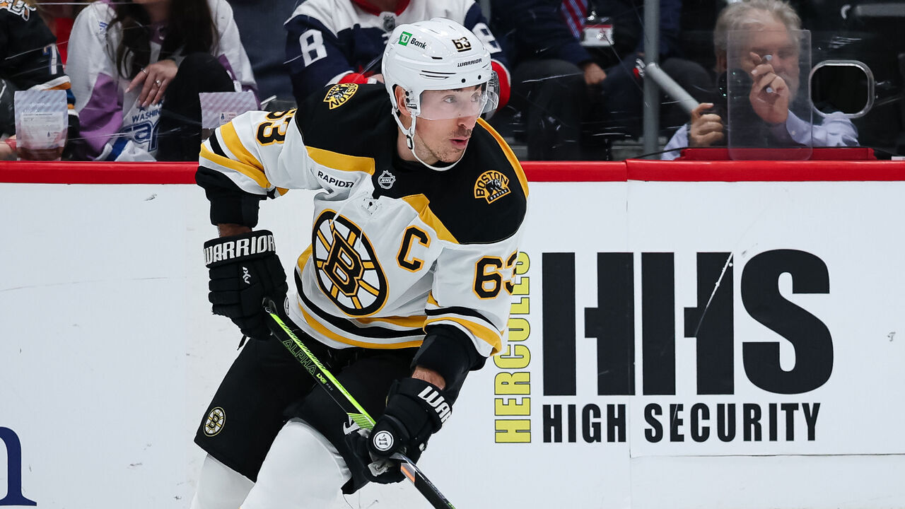 WASHINGTON, DC - DECEMBER 31: Brad Marchand #63 of the Boston Bruins skates with the puck against the Washington Capitals during the second period of the game at Capital One Arena on December 31, 2024 in Washington, DC.