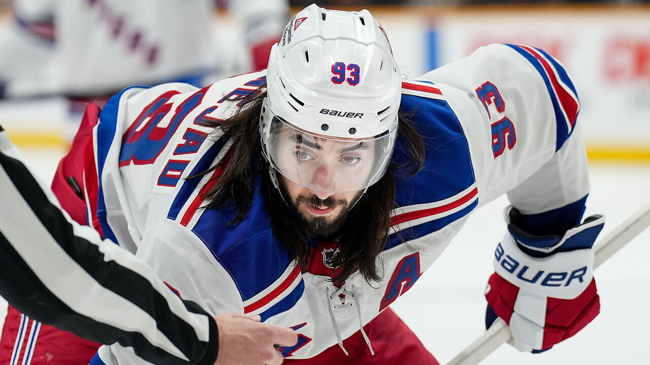 NASHVILLE, TENNESSEE - DECEMBER 17: Mika Zibanejad #93 of the New York Rangers faces off against the Nashville Predators during an NHL game at Bridgestone Arena on December 17, 2024 in Nashville, Tennessee.
