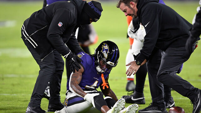 BALTIMORE, MARYLAND - JANUARY 04: Zay Flowers #4 of the Baltimore Ravens lays on the field after an apparent injury during the second quarter against the Cleveland Browns at M&T Bank Stadium on January 04, 2025 in Baltimore, Maryland.