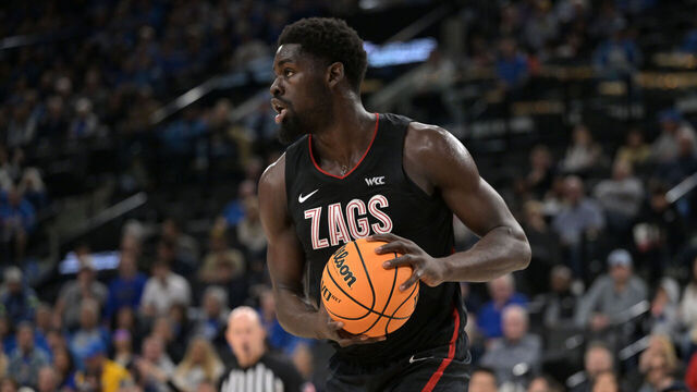 INGLEWOOD, CALIFORNIA - DECEMBER 28: Graham Ike #13 of the Gonzaga Bulldogs handles the ball against the UCLA Bruins at Intuit Dome on December 28, 2024 in Inglewood, California.