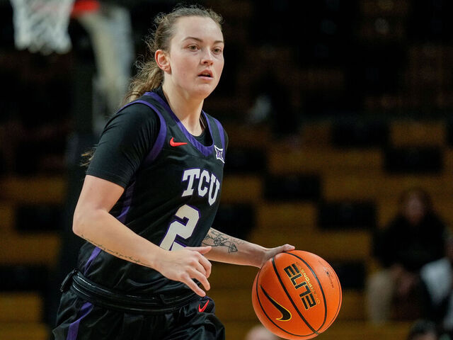 ORLANDO, FL - DECEMBER 21: TCU Horned Frogs guard Madison Conner (2) dribbles ahead during a game between TCU Horned Frogs and the UCF Knights on December 21, 2024 at Addition Financial Arena in Orlando, Fl