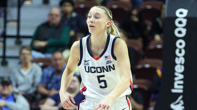 UNCASVILLE, CT - DECEMBER 17: UConn Huskies guard Paige Bueckers (5) dribbles the ball up court during the 2024 college Basketball Hall of Fame Women's Showcase game between Iowa State Cyclones and UConn Huskies on December 17, 2024, at Mohegan Sun Arena in Uncasville, CT.