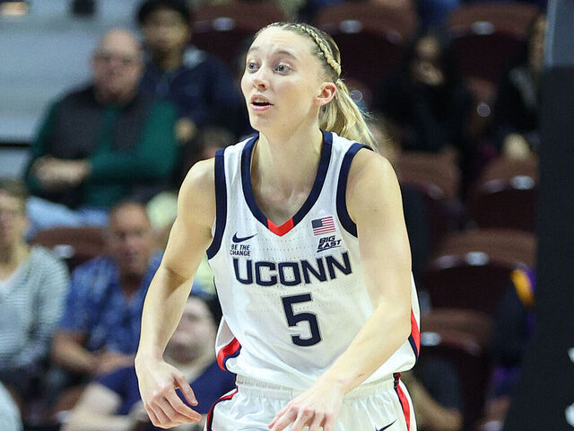 UNCASVILLE, CT - DECEMBER 17: UConn Huskies guard Paige Bueckers (5) dribbles the ball up court during the 2024 college Basketball Hall of Fame Women's Showcase game between Iowa State Cyclones and UConn Huskies on December 17, 2024, at Mohegan Sun Arena in Uncasville, CT.