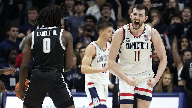 STORRS, CONNECTICUT - JANUARY 5: Alex Karaban #11 of the Connecticut Huskies reacts after the Providence Friars turnover during the second half of an NCAA basketball game at the Harry A. Gampel Pavilion on January 5, 2025 in Storrs, Connecticut. The Huskies defeated the Friars 87-84.