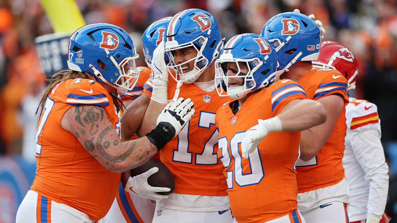 DENVER, COLORADO - JANUARY 05: Devaughn Vele #17 of the Denver Broncos celebrates with teammates after scoring a touchdown in the second quarter against the Kansas City Chiefs at Empower Field At Mile High on January 05, 2025 in Denver, Colorado.