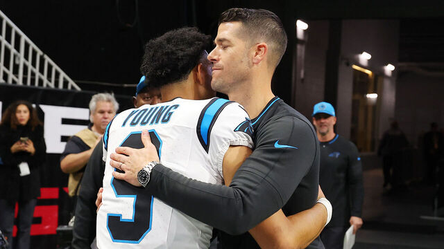 ATLANTA, GEORGIA - JANUARY 05: Bryce Young #9 of the Carolina Panthers hugs head coach Dave Canales of the Carolina Panthers after the game against the Atlanta Falcons at Mercedes-Benz Stadium on January 05, 2025 in Atlanta, Georgia.