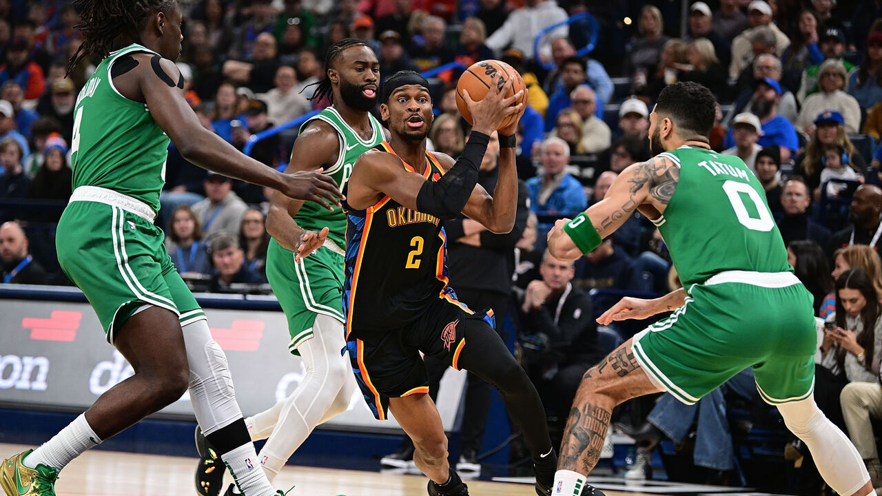 OKLAHOMA CITY, OKLAHOMA - JANUARY 5: Shai Gilgeous-Alexander #2 of the Oklahoma City Thunder handles the ball during the first half against the Boston Celtics at Paycom Center on January 5, 2025 in Oklahoma City, Oklahoma.