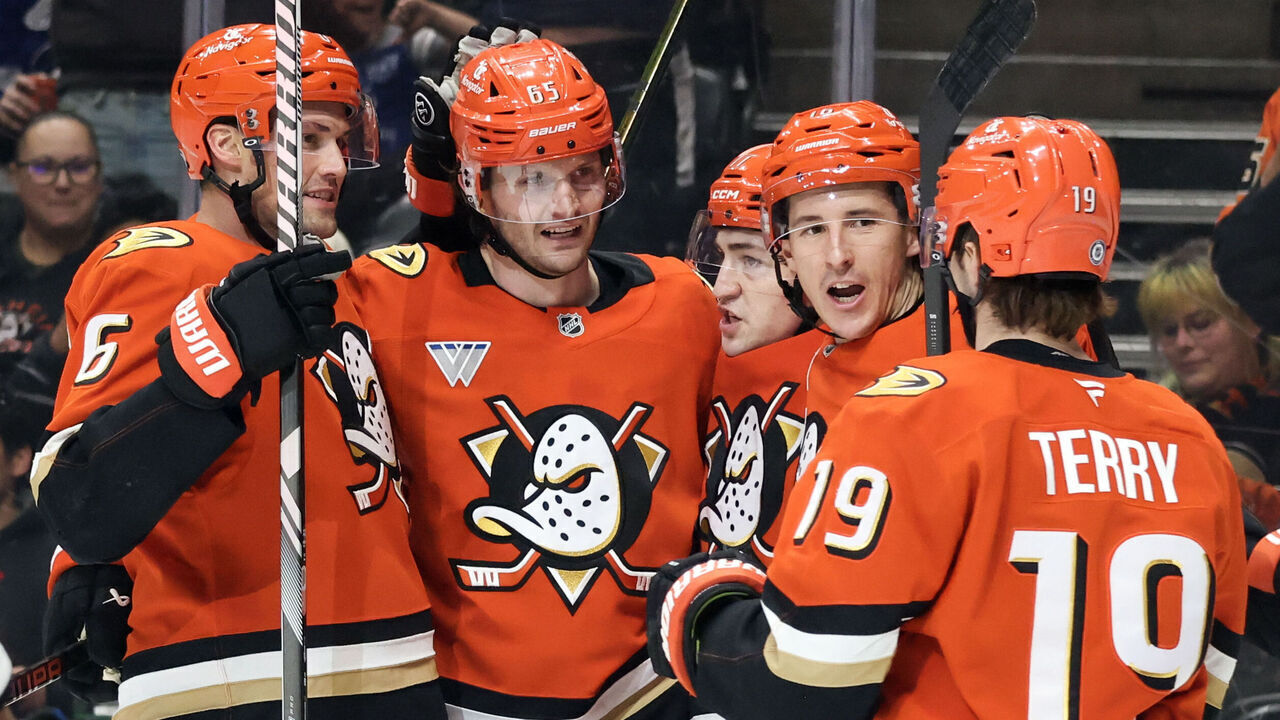 ANAHEIM, CA - JANUARY 5: Brian Dumoulin #6, Jacob Trouba #65, Frank Vatrano #77, Ryan Strome #16, and Troy Terry #19 of the Anaheim Ducks celebrate a goal in the first period of the game against the Tampa Bay Lightning on January 5, 2025 at Honda Center in Anaheim, California.