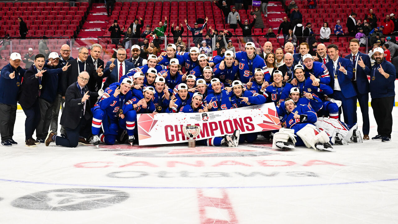 OTTAWA, CANADA - JANUARY 05: Team USA poses with the IIHF Cup after winning gold in overtime against Team Finland during the 2025 IIHF World Junior Championship at Canadian Tire Centre on January 5, 2025 in Ottawa, Ontario, Canada.