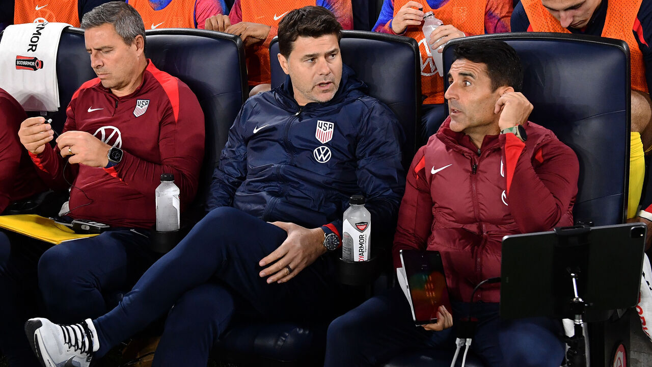 ST LOUIS, MISSOURI - NOVEMBER 18: United States Head Coach Mauricio Pochettino and assistant coach Jesus Perez in discussion during a game between the United States and Jamaica during the CONCACAF Nations Cup quarter final second leg at Citypark on November 18, 2024 in St Louis, Missouri.
