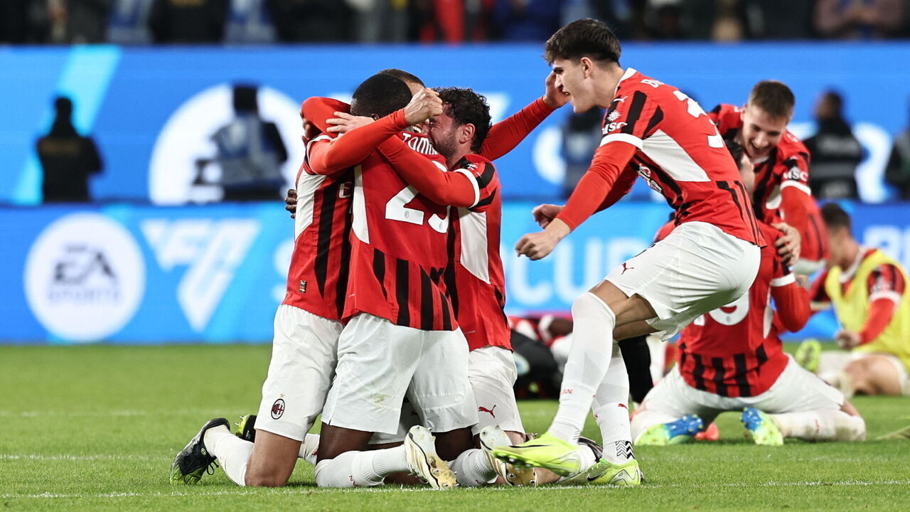 AC Milan's players celebrate after winning the Italian Super Cup final football match between Inter Milan and AC Milan at the Al-Awwal Park in Riyadh on January 6, 2025.