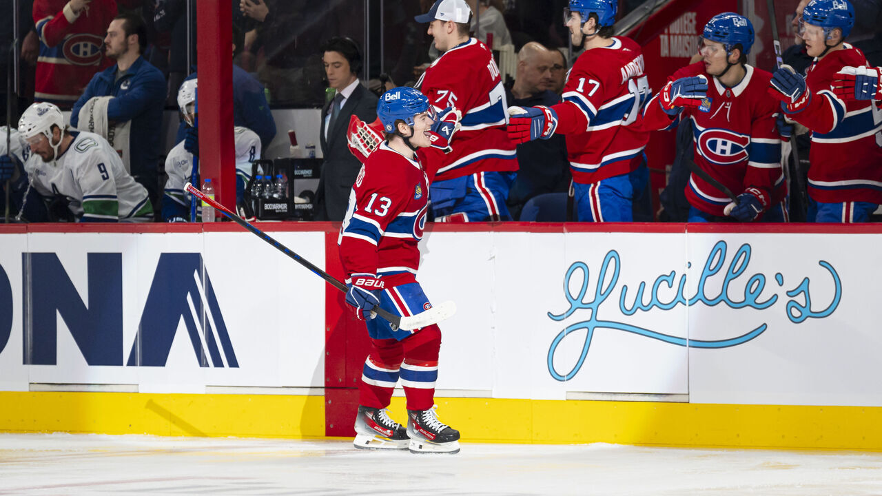 MONTREAL, CANADA- JANUARY 6: Cole Caufield #13 of the Montreal Canadiens celebrates a goal with the bench during the first period of the NHL regular season game between the Montreal Canadiens and the Vancouver Canucks at the Bell Centre on January 6, 2025 in Montreal, Quebec, Canada.