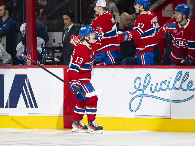 MONTREAL, CANADA- JANUARY 6: Cole Caufield #13 of the Montreal Canadiens celebrates a goal with the bench during the first period of the NHL regular season game between the Montreal Canadiens and the Vancouver Canucks at the Bell Centre on January 6, 2025 in Montreal, Quebec, Canada.