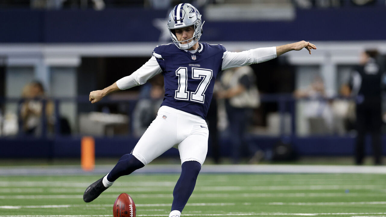 ARLINGTON, TEXAS - JANUARY 05: Brandon Aubrey #17 of the Dallas Cowboys warms up before the game against the Washington Commanders at AT&T Stadium on January 05, 2025 in Arlington, Texas.