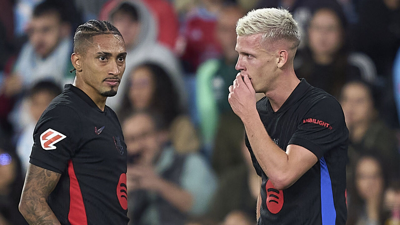 Dani Olmo of FC Barcelona talks with Raphinha of FC Barcelona during the La Liga EA Sports match between RC Celta de Vigo and FC Barcelona at Estadio Abanca Balaidos in Vigo, Spain, on November 23, 2024.