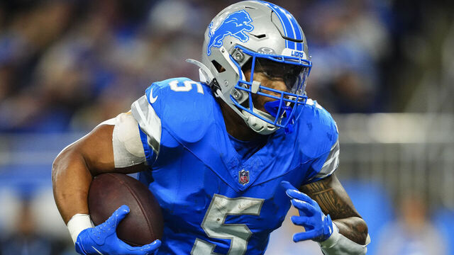 DETROIT, MI - DECEMBER 05: David Montgomery #5 of the Detroit Lions runs the ball during an NFL football game against the Green Bay Packers at Ford Field on December 5, 2024 in Detroit, Michigan.