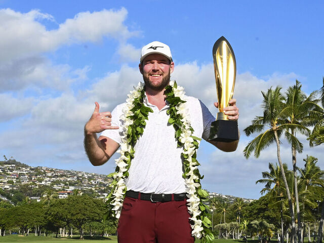 HONOLULU, HAWAII - JANUARY 14: Grayson Murray poses with the winner's trophy after winning the Sony Open in Hawaii at Waialae Country Club on January 14, 2024 in Honolulu, Hawaii.