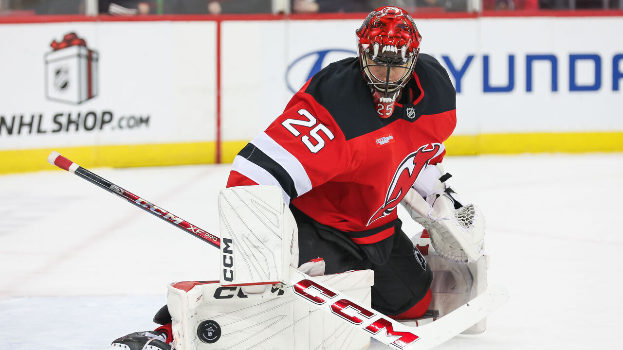 NEWARK, NJ - DECEMBER 23: New Jersey Devils goaltender Jacob Markstrom (25) makes a save during a NHL game between the New York Rangers and New Jersey Devils at Prudential Center on December 23, 2024 in Newark, New Jersey.
