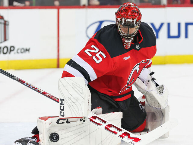 NEWARK, NJ - DECEMBER 23: New Jersey Devils goaltender Jacob Markstrom (25) makes a save during a NHL game between the New York Rangers and New Jersey Devils at Prudential Center on December 23, 2024 in Newark, New Jersey.