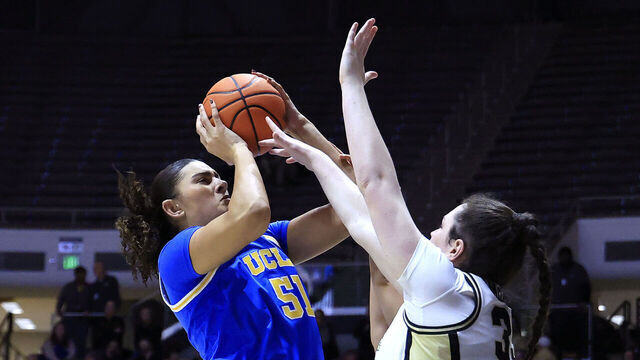 WEST LAFAYETTE, INDIANA - JANUARY 07: Lauren Betts #51 of the UCLA Bruins takes a shot over Lana McCarthy #35 of the Purdue Boilermakers during the second half at Mackey Arena on January 07, 2025 in West Lafayette, Indiana.