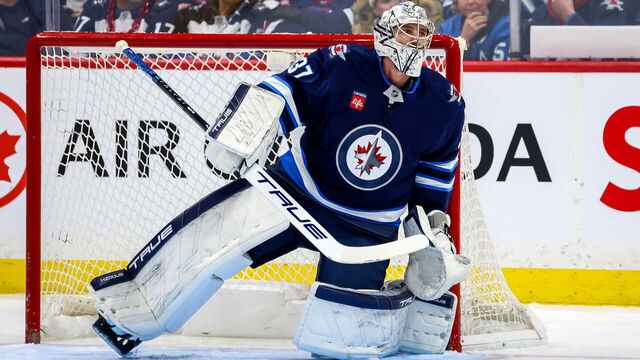 WINNIPEG, CANADA - JANUARY 4: Goaltender Connor Hellebuyck #37 of the Winnipeg Jets guards the net during second period action against the Detroit Red Wings at the Canada Life Centre on January 4, 2025 in Winnipeg, Manitoba, Canada.