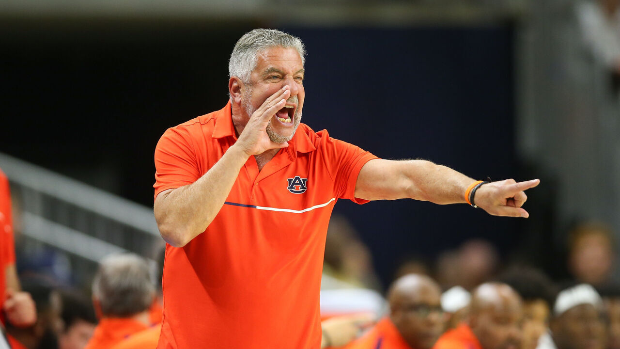 AUBURN, ALABAMA - DECEMBER 30: Bruce Pearl head coach of the Auburn Tigers yells instructions to his team during the first half against the Monmouth Hawks at Neville Arena on December 30, 2024 in Auburn, Alabama.