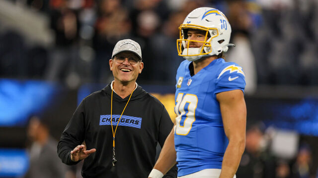 Inglewood, CA, Sunday, November 17, 2024 - Chargers head coach Jim Harbaugh with Justin Herbert during pregame warmups before a game against the Cincinnati Bengals at SoFi Stadium. (Robert Gauthier/Los Angeles Times via Getty Images)