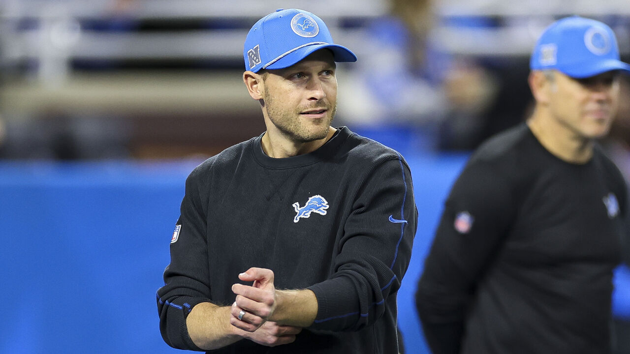 DETROIT, MICHIGAN - NOVEMBER 28: Offensive coordinator Ben Johnson of the Detroit Lions looks on before a game against the Chicago Bears at Ford Field on November 28, 2024 in Detroit, Michigan.