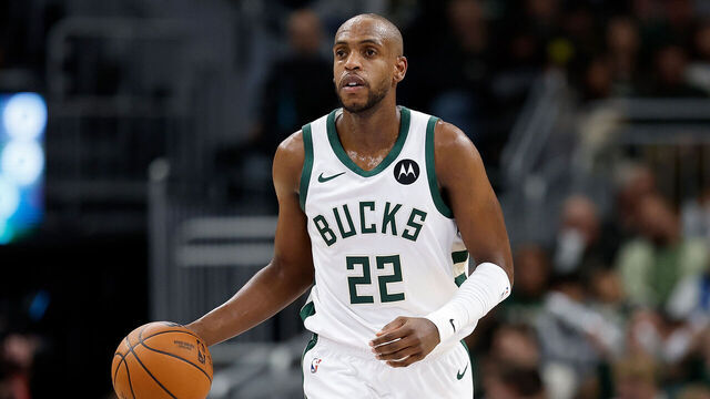 MILWAUKEE, WISCONSIN - JANUARY 04: Khris Middleton #22 of the Milwaukee Bucks dribbles up court during the second half of the game against the Portland Trail Blazers at Fiserv Forum on January 04, 2025 in Milwaukee, Wisconsin.